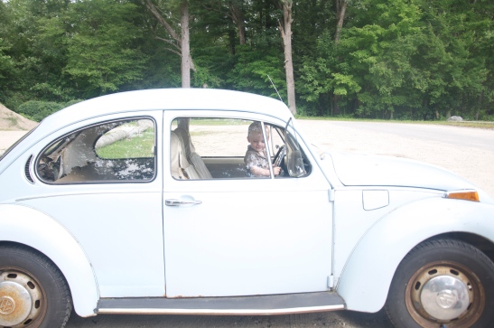 Mica at the wheel of a 69 VW Bug 2010